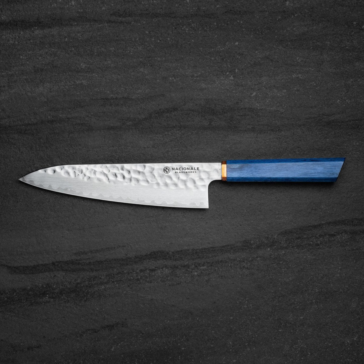 NACIONALE BLADEWORKS 215mm Gyuto. Hammered San Mai 440C Stainless. Blue Pakka /